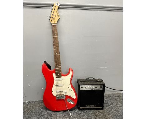 An Elevation electric guitar and portable amplifier.