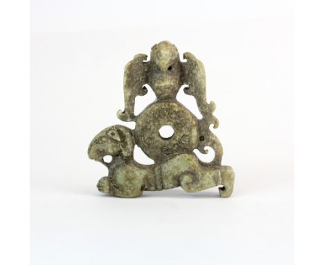 A Chinese archaic form carved jade amulet, H. 7cm.