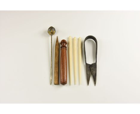 20th century AD. A mixed group of Viking style dress accessories comprising: hand-forged iron shears; a wooden stylus with er