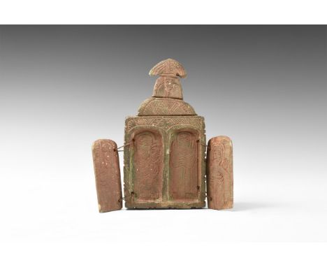 Ethiopian, 19th century AD. A double sided stone shrine with two doors to either face carved with crosses and figures of sain
