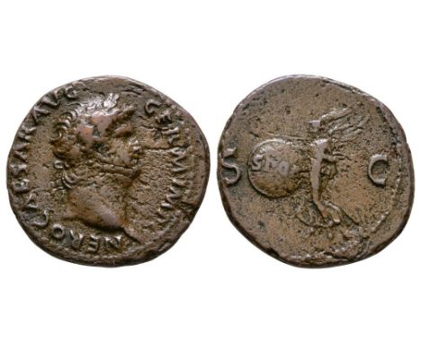 54-68 AD. Rome mint: Obv: NERO CAESAR AVG GERM IMP legend with laureate bust right. Rev: Victory alighting holding shield ins