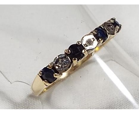 A lady's 9ct gold half eternity ring, set with sapphire and diamond, size Q1/2, approx weight 1.3 grams