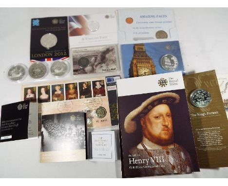 Numismatology - a small collection of modern commemorative coins to include the UK's first £20 coin, two sterling silver Mary