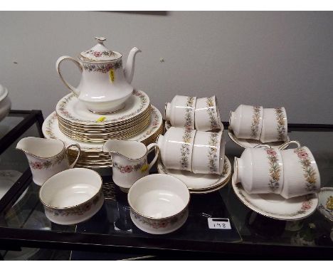 An eight piece tea service by Paragon decorated in the Belinda pattern comprising approx 49 pieces