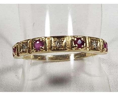 A lady's 9ct gold half eternity ring, set with ruby and diamond, size N1/2, approx weight 1.6 grams (all in)