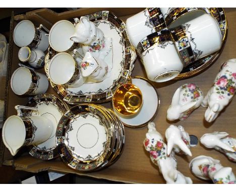 A Stanley china ceramic tea service, a collection of Staffordshire ceramic animal figurines and other
