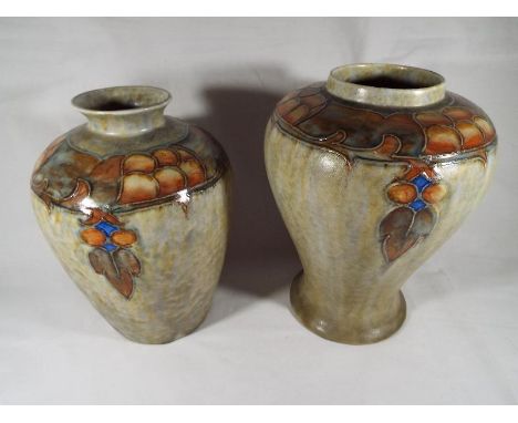 Two Cranston Pearl Pottery vases with Art Nouveau slip lined foliate decoration, factory marks to the base, approx 20 cm (hig