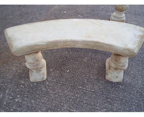 A reconstituted stone bench