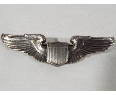 A World War Two (WWII) silver Army Air Corps Pilots pin wings, stamped sterling, 8cm (w)