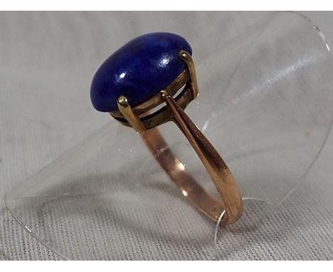 A lady's 9ct rose gold and cabachon Lapis Lazuli dress ring, approx weight 2.63grams (all in) size L and a half Est £30 - £50