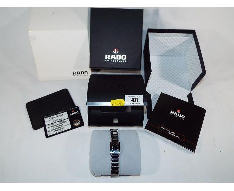 A lady's designer Rado Jubilee wristwatch with square fascia lacking numbers encrusted with twelve diamond chips and original