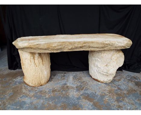 A reconstituted stone bench
