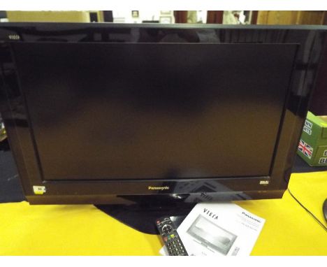 A Panasonic LCD television, Model TX-32LXD700, 32 inch, with manual and remote control