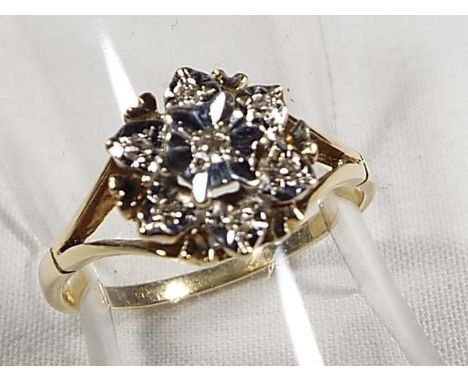 A lady's 9ct gold diamond cluster ring, size L1/2, approx weight 1.8 grams