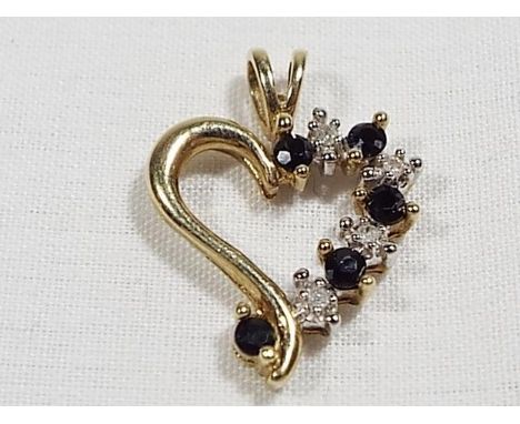 A 9ct gold heart shaped pendant set with sapphire diamond, approx weight 1.5 grams (all in)