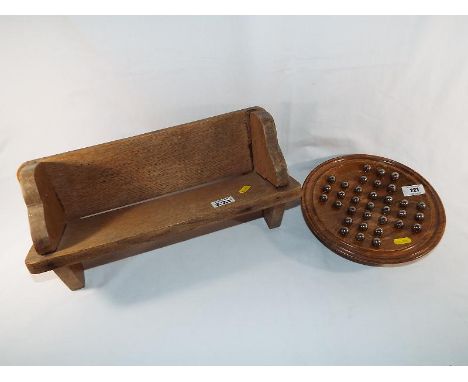 An unusual book stand in the form of a garden bench and a wooden ball bearing solitaire (2)
