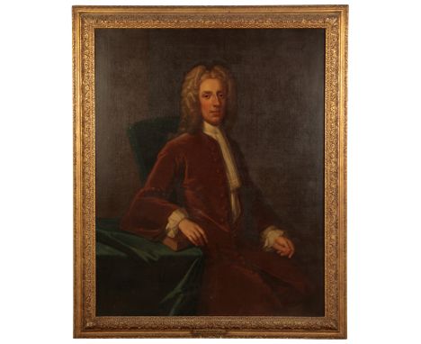 ATTRIBUTED TO JOHN VANDERBANK (1694-1739) A portrait of William Plumer seated, three-quarter length wearing a brown coat, oil