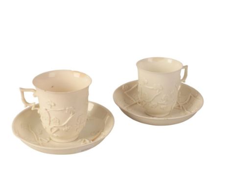 A PAIR OF BLANC DE CHINE PORCELAIN CUPS AND SAUCERS fleur de lys mark to the base, possibly Rouen, the bodies decorated with 