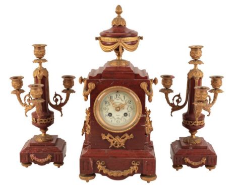 A FRENCH GRIOTTE UNI MARBLE CLOCK GARNITURE 19th century, the two train movement striking on a bell, the enamel dial indistin