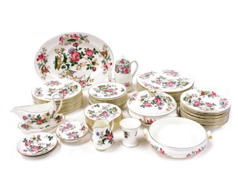 A Wedgwood porcelain part dinner and coffee service decorated in the Charnwood pattern, comprising an oval meat platter, pair