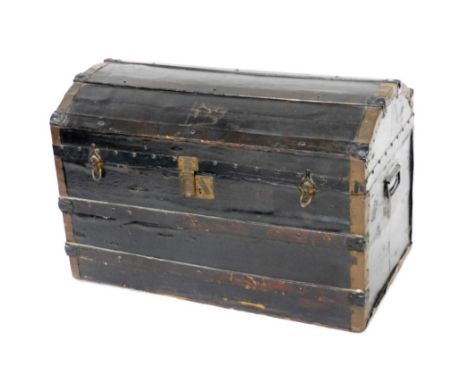 A Victorian leather trunk, wooden and metal bound with twin carrying handles, 55cm high, 85cm wide, 47cm deep. 