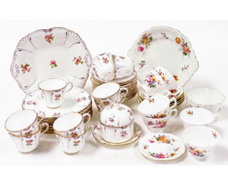 A mid 19thC Staffordshire porcelain part tea service, decorated with rose sprays, comprising bread plate, nine teacups, ten s