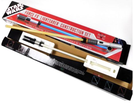 A Star Wars Yoda Force FX light sabre, boxed, and a Star Wars Master Replicas Force FX light sabre construction set, boxed. 