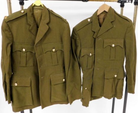 Two post World War II British Royal Army Service dress jackets, size unknown.