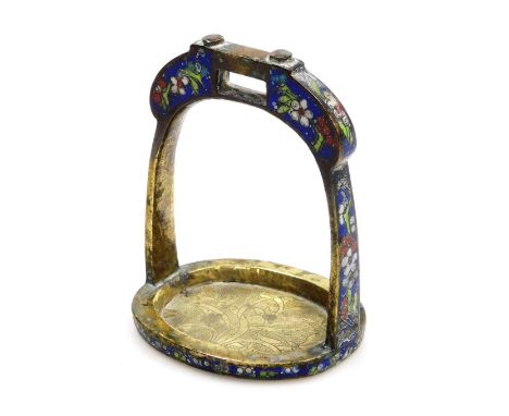 A Chinese brass and champleve enamel stirrup cup, engraved to top with scrolls and leaves, 9.5cm high, 7.5cm wide. 