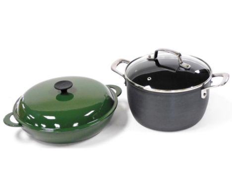 A Le Creuset green enamel paella pan and cover, together with a Tefal Jamie Oliver casserole dish and cover. (2)