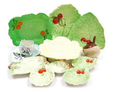 A group of Carltonware leaf moulded pottery, including dishes, bowls, and a preserve pot cover and spoon. (a quantity) 