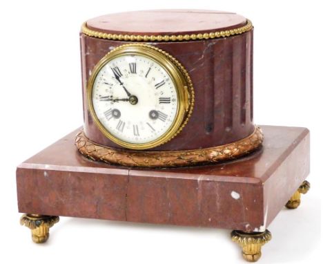 A late 19thC French porphyry marble cased mantel clock, circular enamel dial bearing Roman numerals, eight day movement by L 