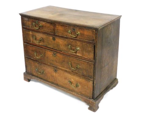 A George III oak chest of two short over three long graduated drawers, raised on bracket feet, 82cm high, 97cm wide, 50.5cm d