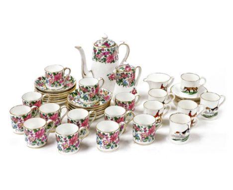 A Crown Staffordshire porcelain coffee service decorated with flowers, comprising coffee pot, covered jug, twelve demi-tasse 