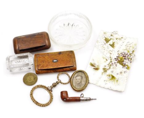 A group of vertu, comprising a Victorian magnifying glass, oval picture frame containing a portrait of a soldier, pipe form p