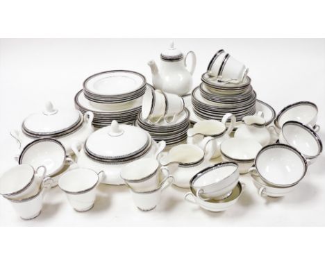 A Royal Doulton porcelain part dinner and tea coffee service, decorated in the Sarabande pattern, including meat platters, ve
