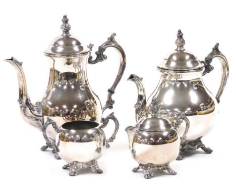 An FB Rogers USA silver plated four piece tea and coffee service, of rococo baluster form, comprising teapot, coffee pot, cre