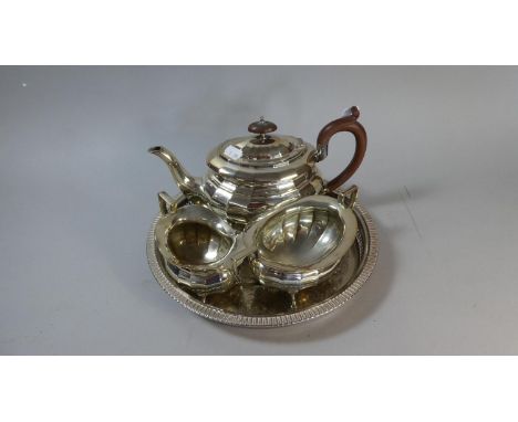 A Silver Plated Three Piece Tea Service on Unrelated Circular Gallery Tray 