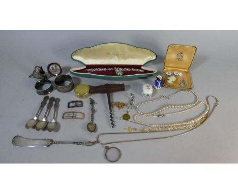 A Tin of Curios Containing Corkscrew, Napkin Rings, Diamante Pearl Effect Jewellery, Silver Plated Chick Pin Cushion etc 