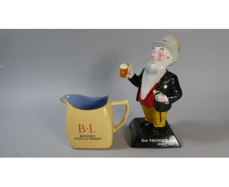 A Vintage William Younger's Tartan Ales Advertising Figure and an Old Rarity Scotch Whisky Water Jug 
