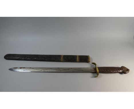 A Brass Mounted Reproduction Short Sword with Carved Wooden Handle and Scabbard, Total Length 83cm 