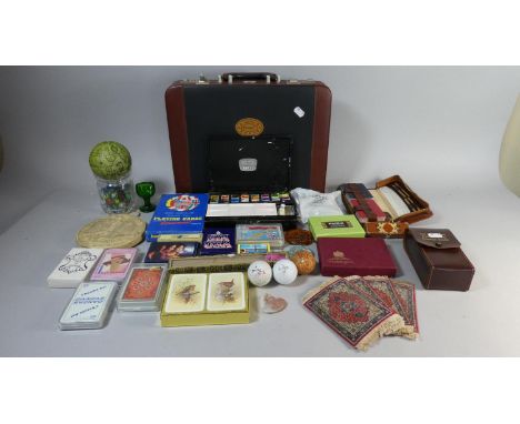 A Prima Briefcase Containing Playing Cards, Marbles, Golf Balls, Oriental Fan, Travel Tokens etc 