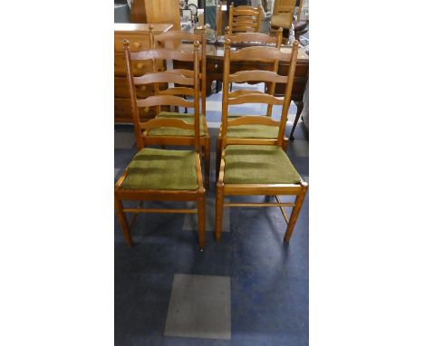 A Set of Four Ercol Pine Ladder Back Chairs 