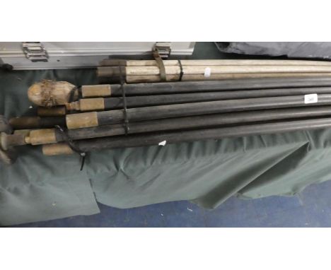 A Set of Extended Draining Rods, Wooden Draining Rods and an Axe 