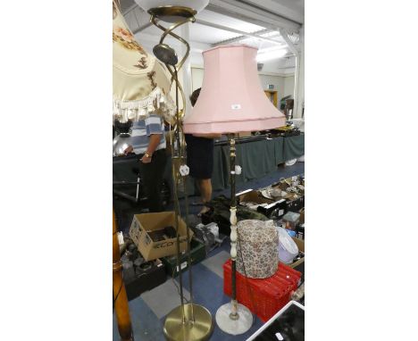 A Modern Metal Uplighter and Brass and Onyx Standard Lamp with Shade 