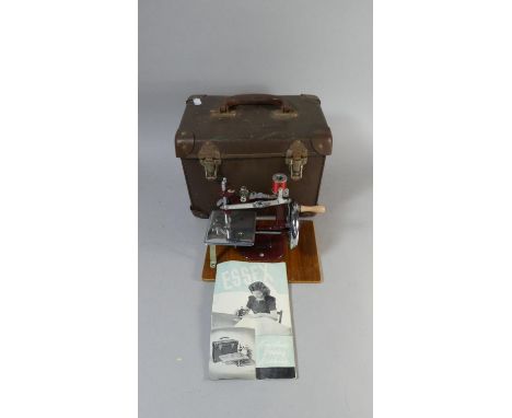 A Vintage Cased Essex Miniature Sewing Machine, With Instruction Book 