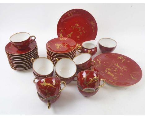 LIMOGES TWELVE PLACE TEA SERVICE, Chinoiserie pattern, retailed by Waring & Gillow Ltd. (one cup lacking, one serving plate w