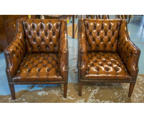 CLUB ARMCHAIRS, a pair, of vintage club style, hand finished leaf brown and deep button upholstered leather and brass studs, 