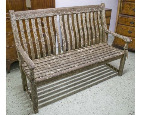 ALEXANDER ROSE GARDEN BENCH, vintage English made, weathered teak with slatted seat and shaped back, 155cm. 