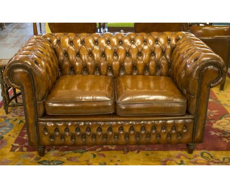 CHESTERFIELD SOFA, vintage hand finished and deep button upholstered leaf brown leather with curved back and arms, 153cm W.